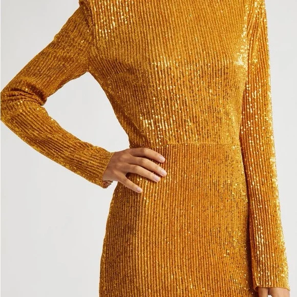 STINE GOYA Gold Carson Dress with complimentary gold and silver sandals. -  www.sanvalentin.cl